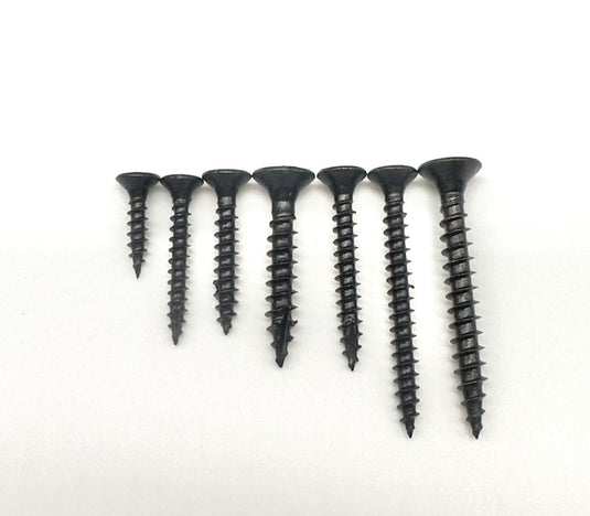 line up of 7 various black countersunk wood screws included in jones diy assorted pack